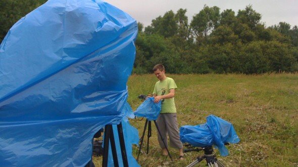 A few 5D mark II's and a RED protected from the rain