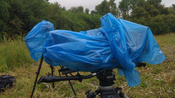 A few 5D mark II's and a RED protected from the rain